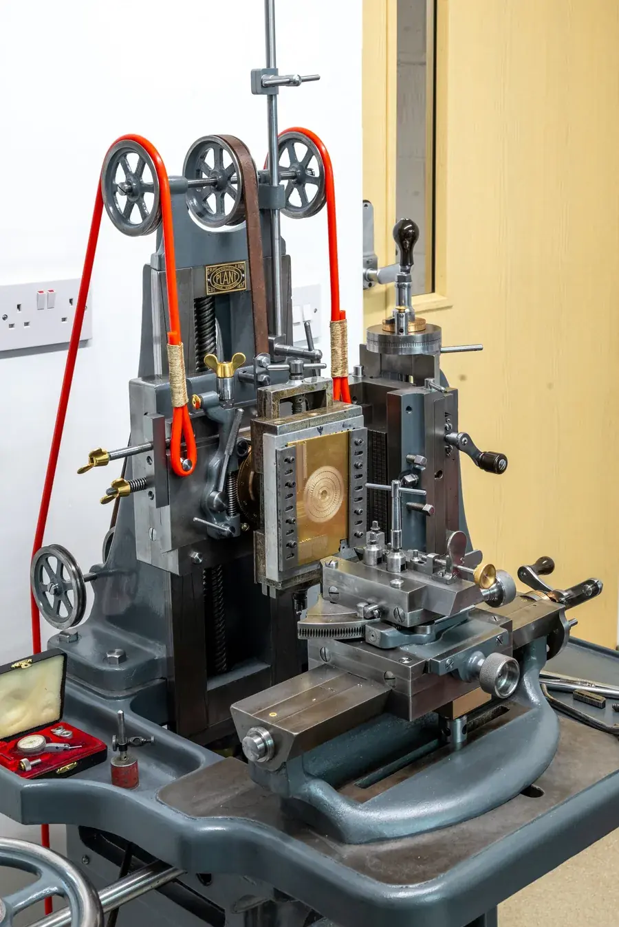 An engine-turning machine in the Garrick workshop